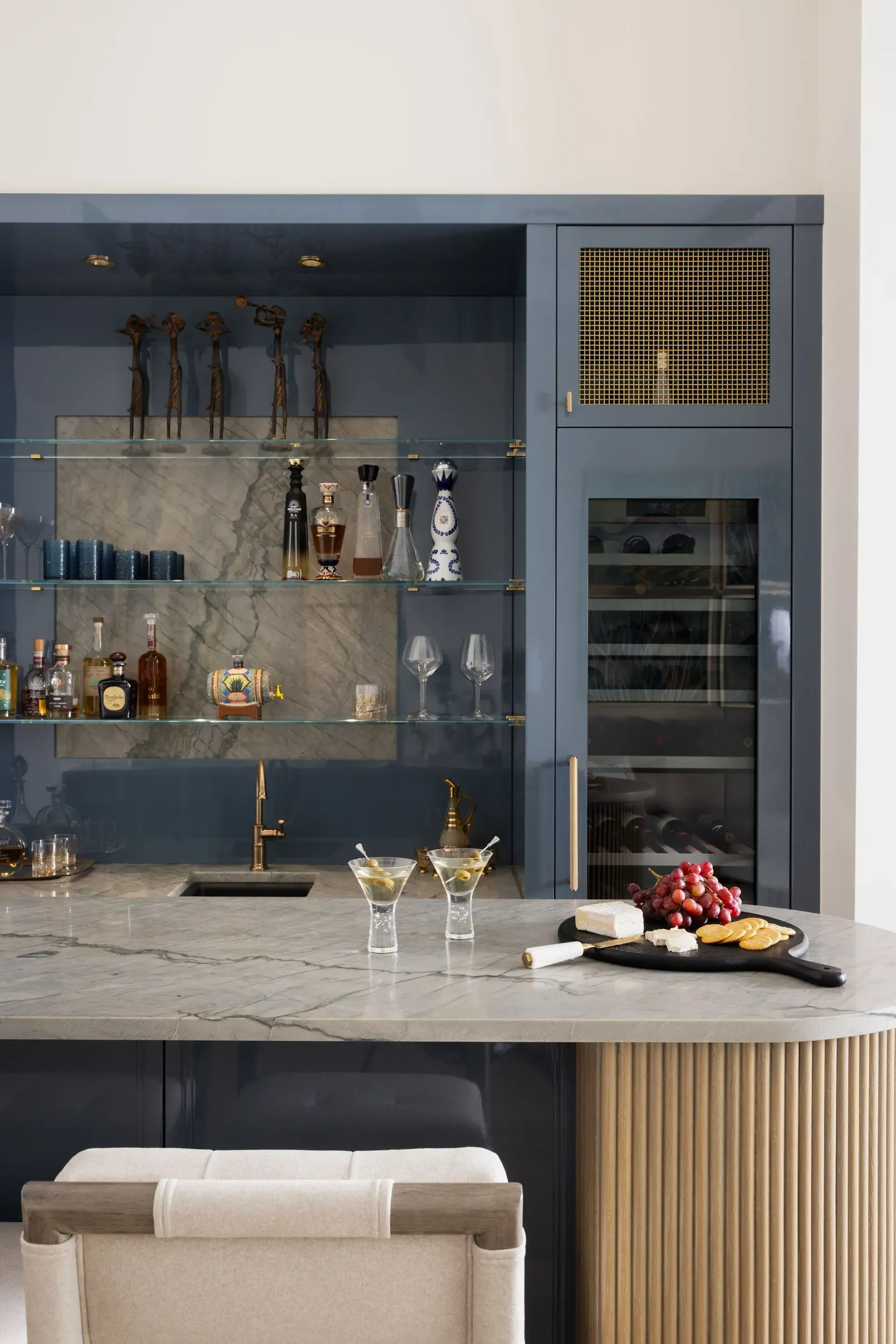 A wine room with a wine fridge.
