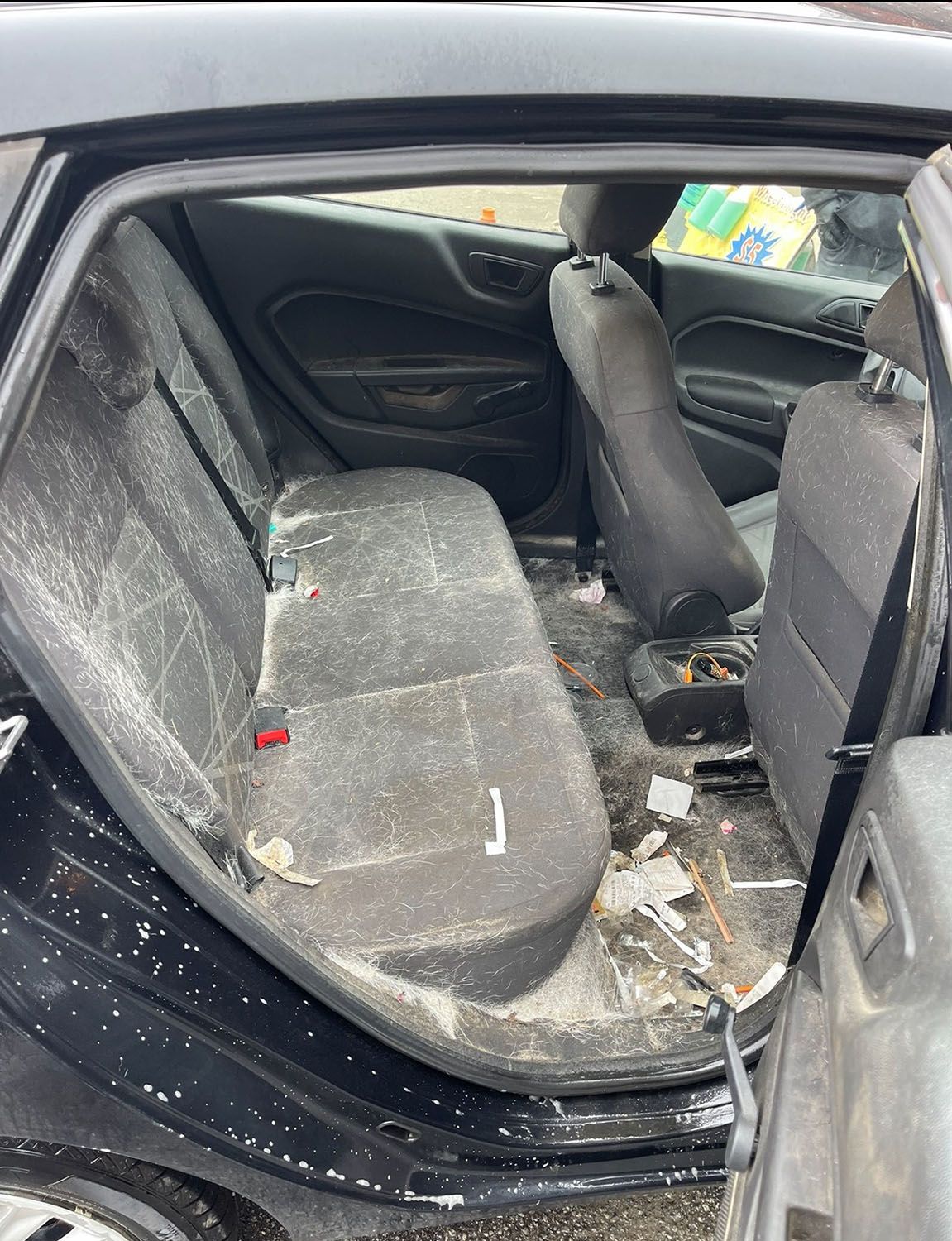 Dirty backseat of a car