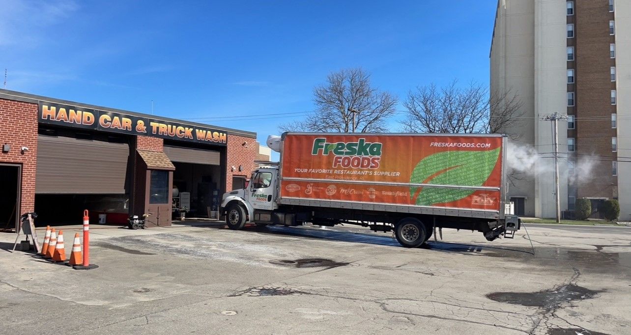 Truck outside a car washing station