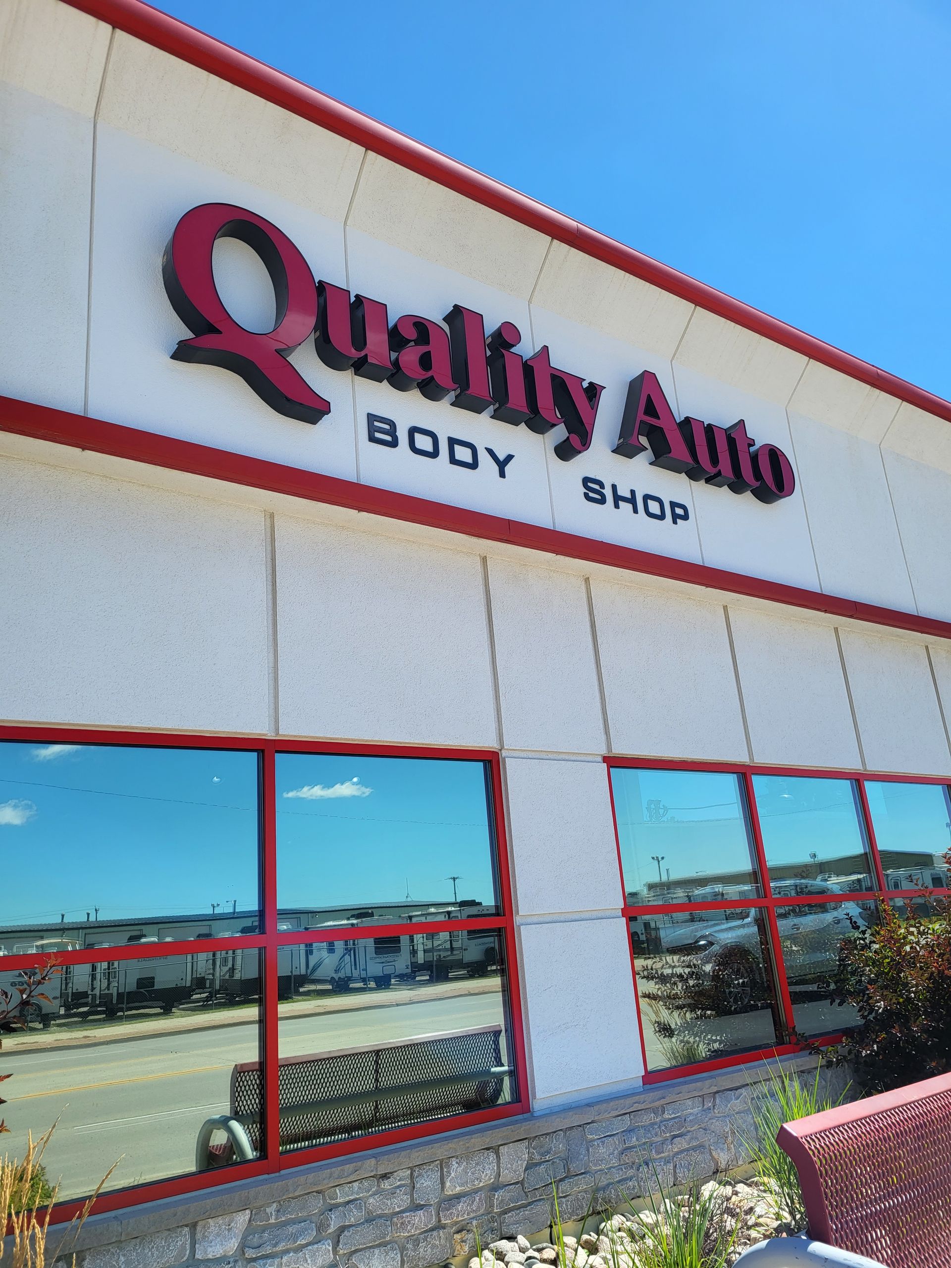 The outside of a Quality Auto Body Shop