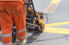 A contractor at work with his line striping