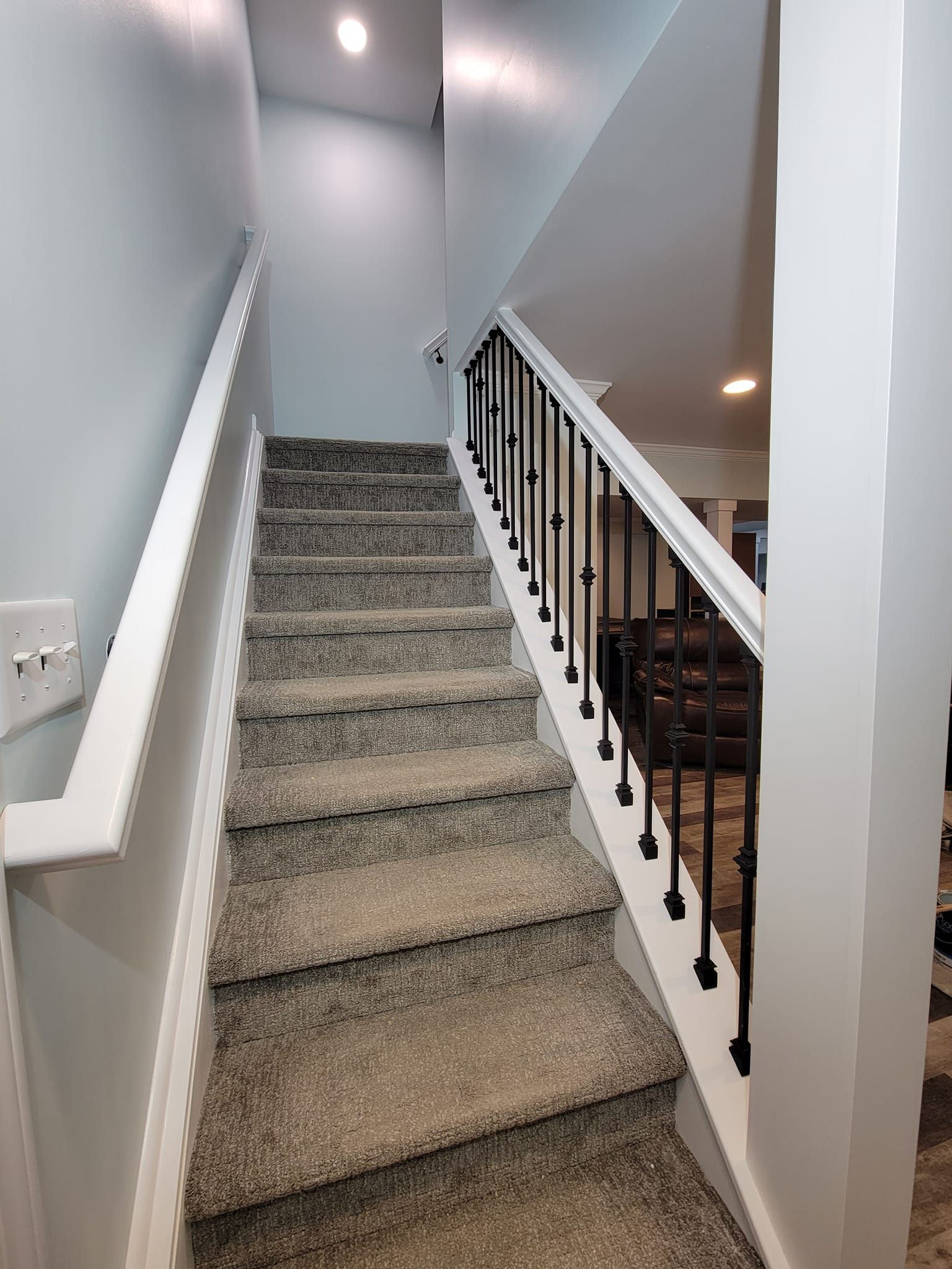 A set of stairs leading up to the second floor of a house