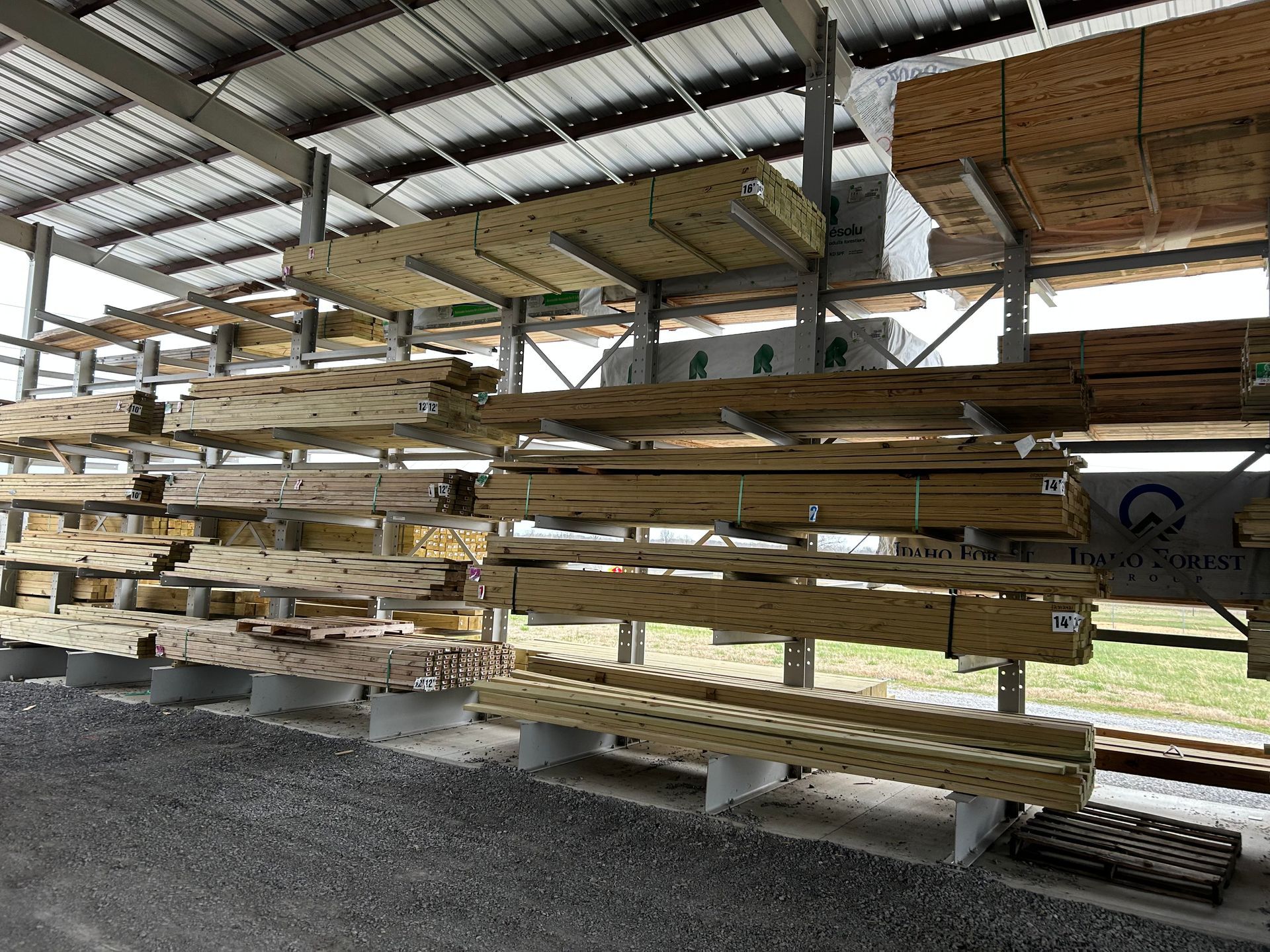 A warehouse filled with lots of wooden pieces.