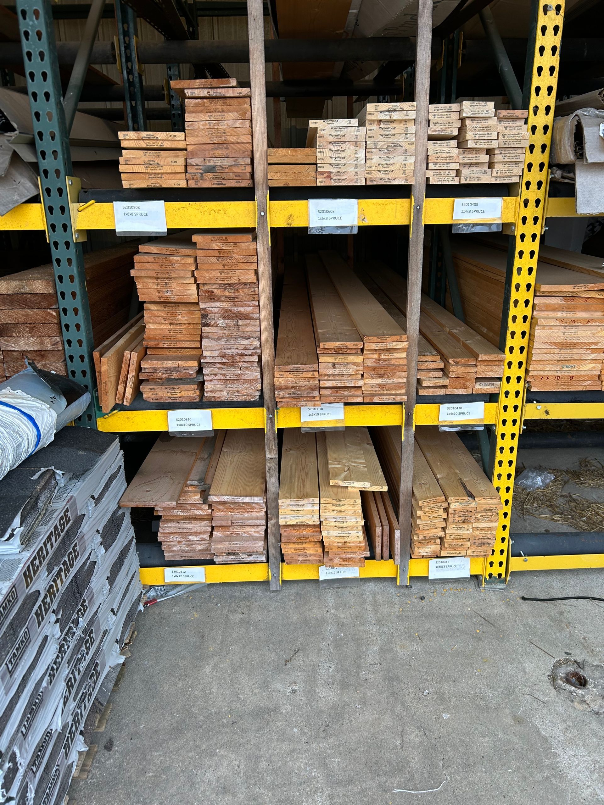A warehouse filled with lots of different types of wood