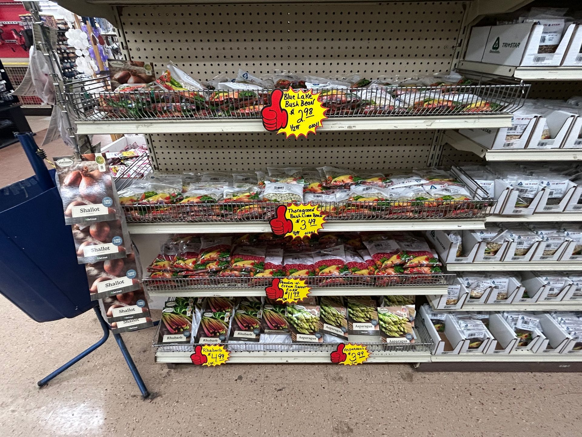 A grocery store aisle with a lot of food on it