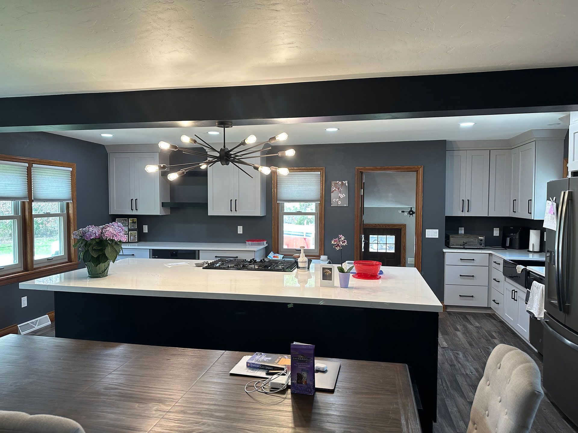 A large island in the middle of the kitchen.