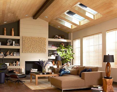 A living room with a couch and a fireplace