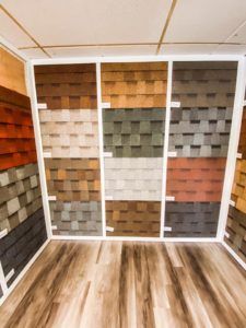There are many different types of shingles on display in this room.