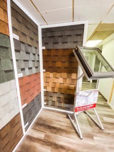 There are many different types of shingles on display in this room.