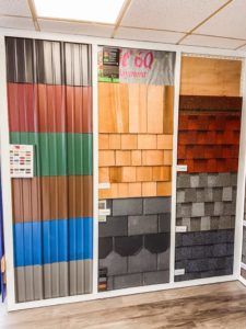 A display of different types of roofing materials in a store.