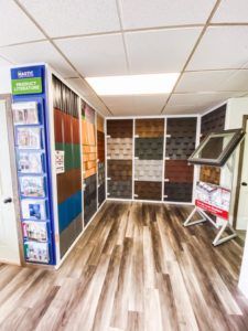 A room with a lot of different types of tiles on the wall