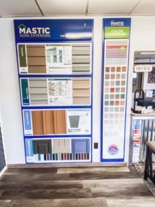 A wall with a lot of different types of cabinets on it.