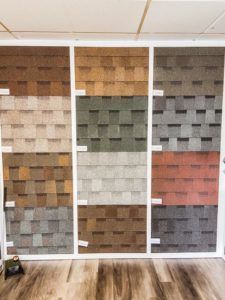 There are many different types of shingles on display in this room.