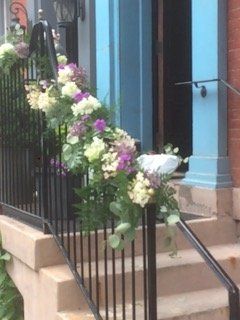 Wedding flowers on handrail