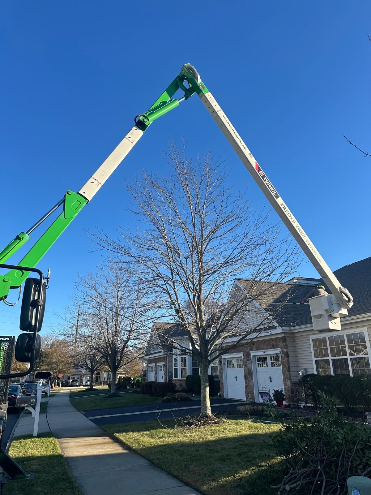 An American flag is flying in front of a building.