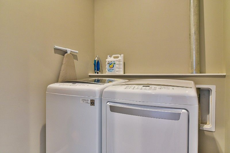 There is a washer and dryer in the laundry room.