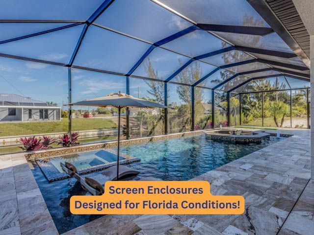 Screened patio enclosure with pool, lounge chairs, and blue mesh roof in a sunny backyard