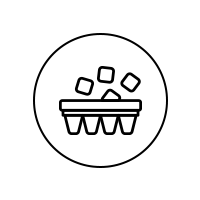 Ice cubes being poured from an ice cube tray, inside a circle.