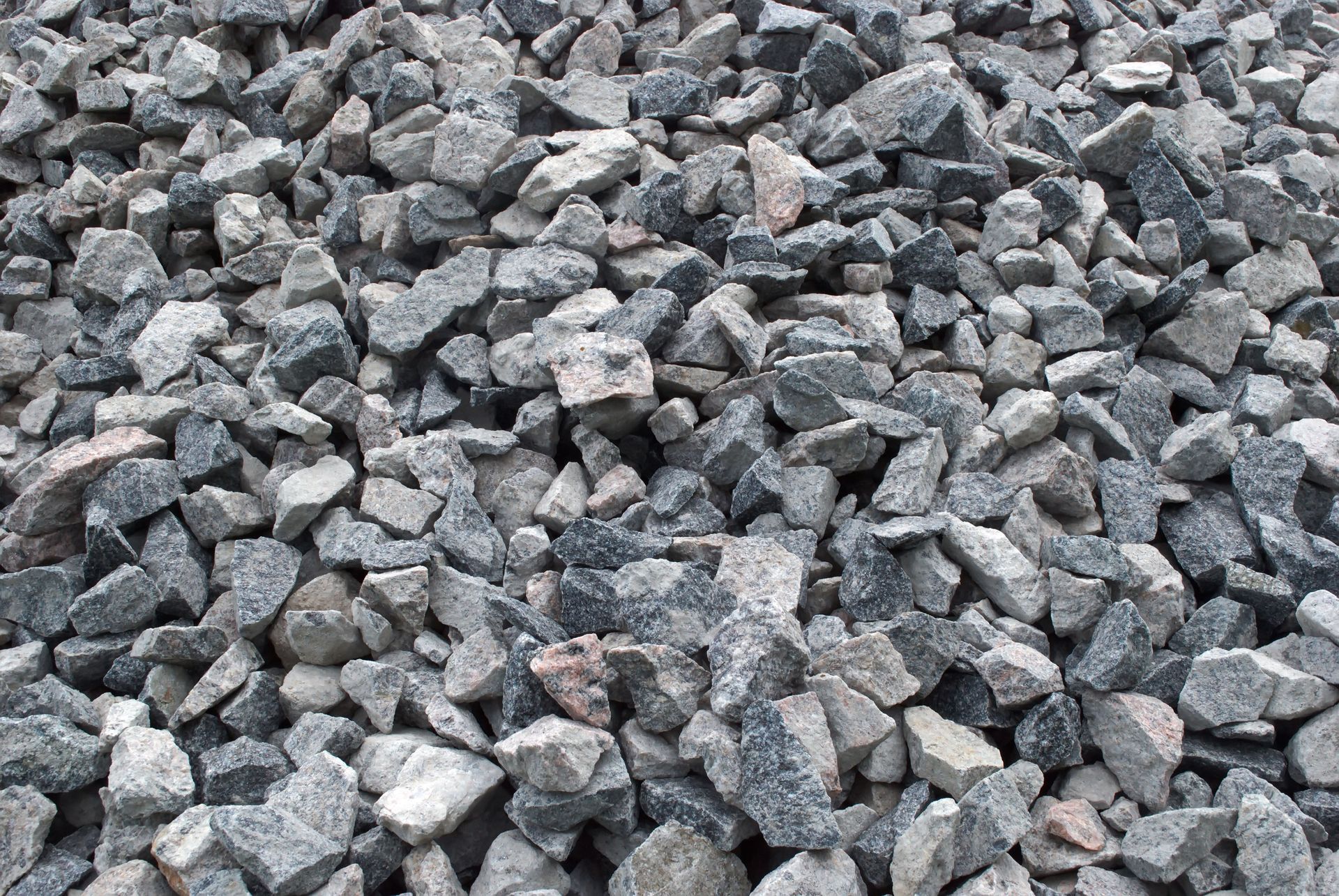 Pile of gray and white crushed rock.