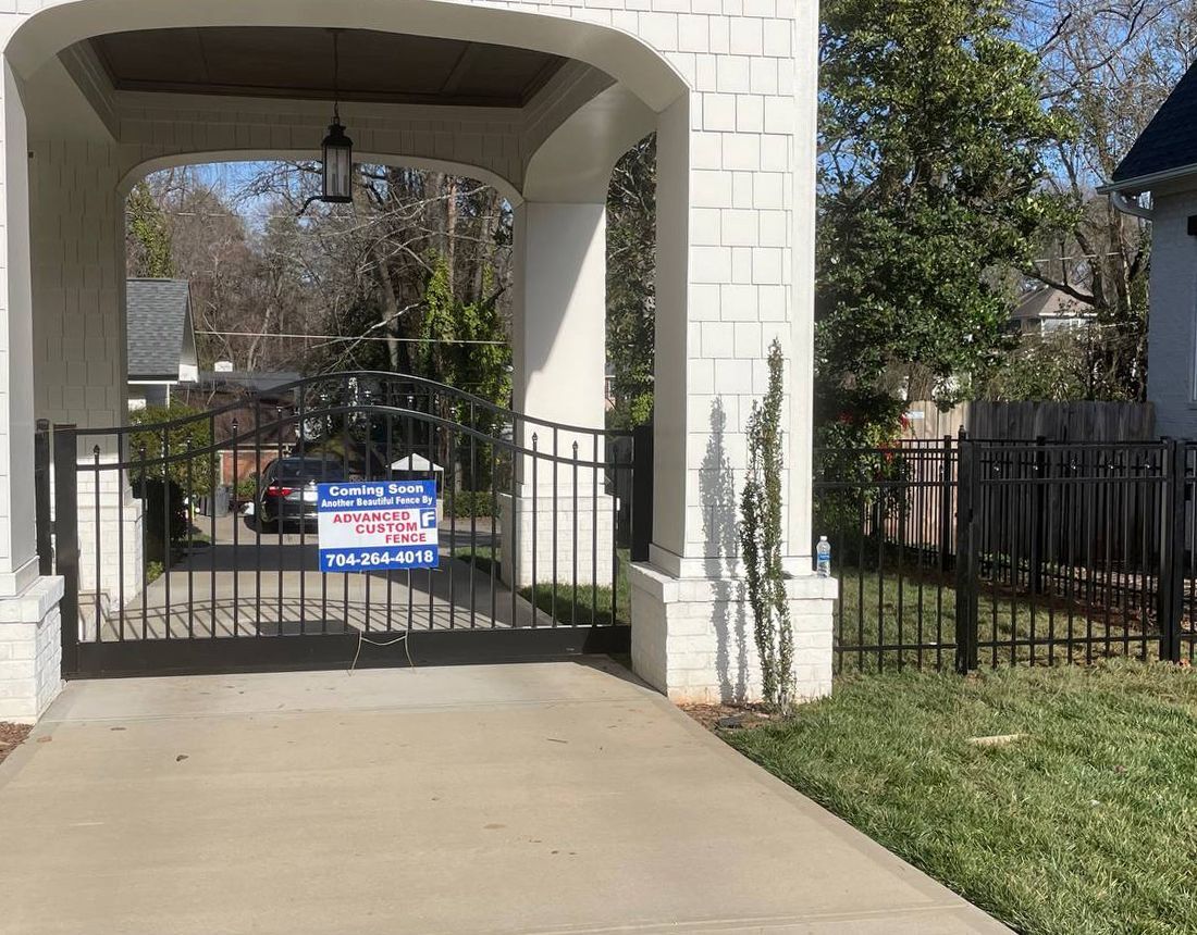 There is a sign on the gate that says `` for sale ''.