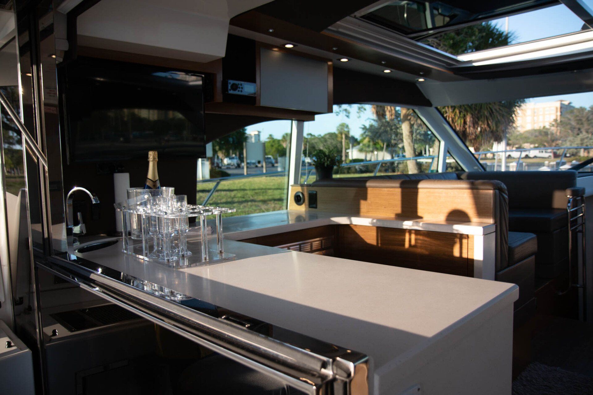 champagne and glasses on the counter