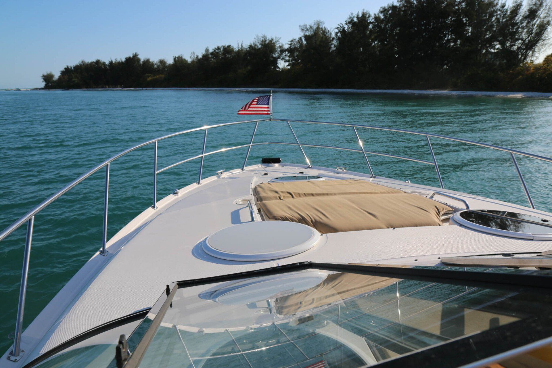 yacht with an American flag