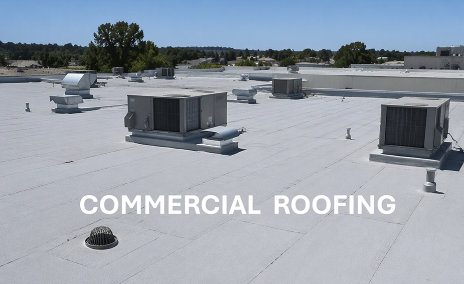 Commercial rooftop with white membrane, HVAC units, and blue sky background