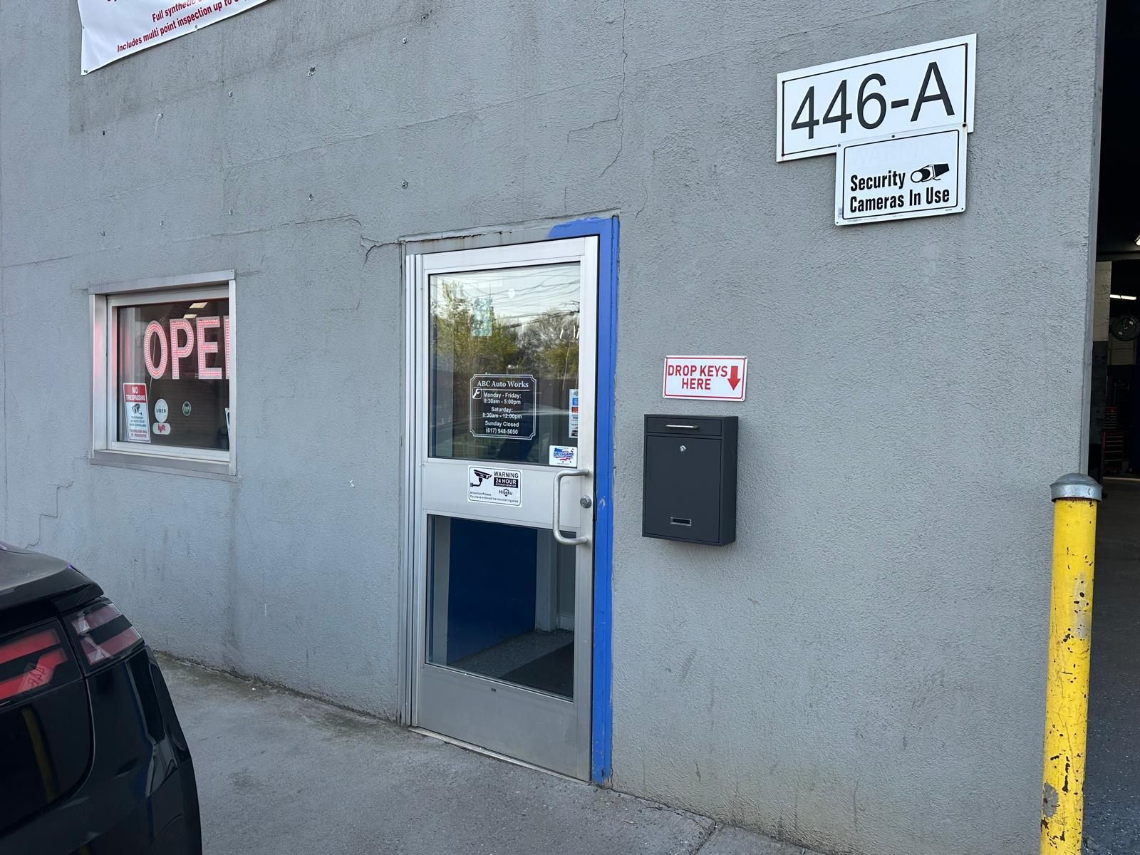 Exterior of a business with a glass door, 