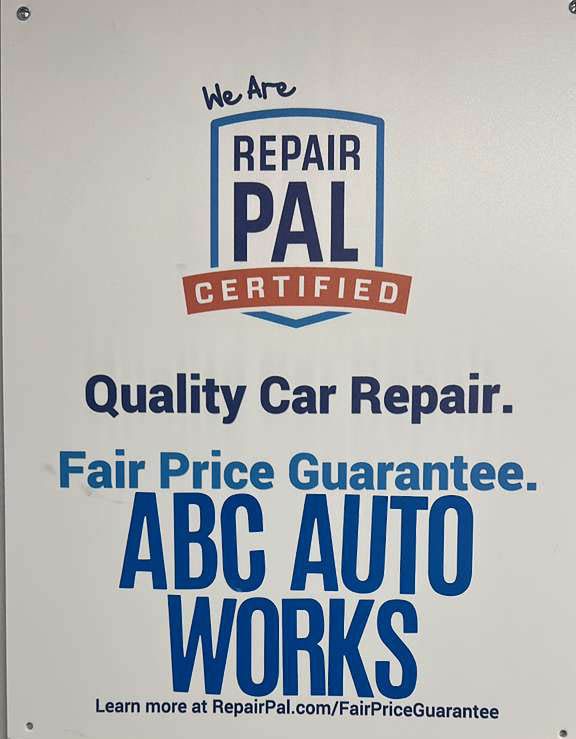 Sign: Repair Pal certified; ABC Auto Works offers quality car repair with a fair price guarantee.
