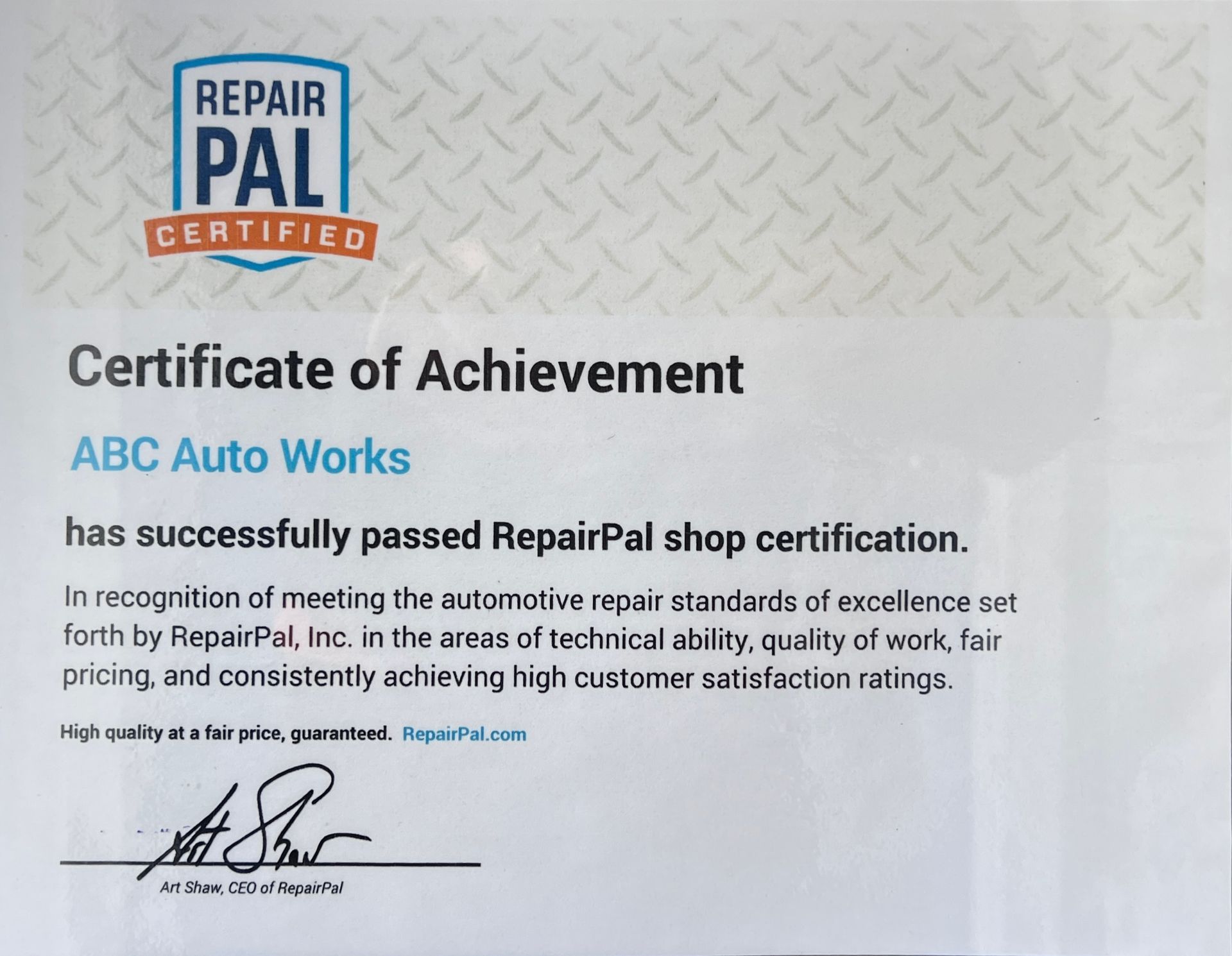 Certificate of Achievement for ABC Auto Works, RepairPal certified shop, with logo and signature.