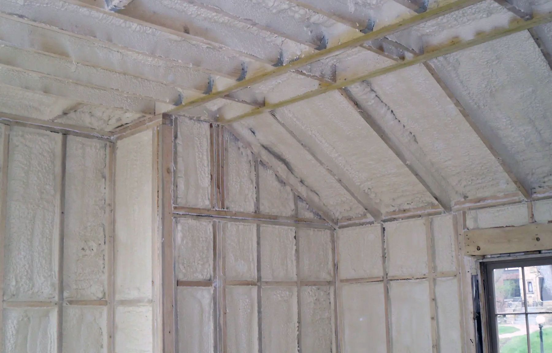 a room with a ceiling and walls covered in foam