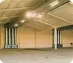 a large empty room with a ceiling that is very high