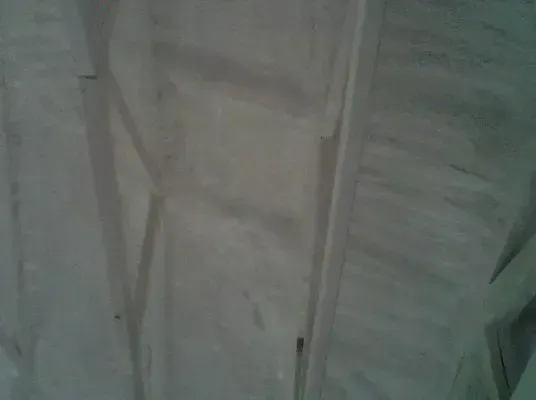 a close up of a white cloth with a zipper on it