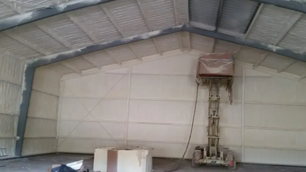 a large building with a forklift in the middle of it