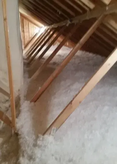 there is a lot of insulation in the attic of a house