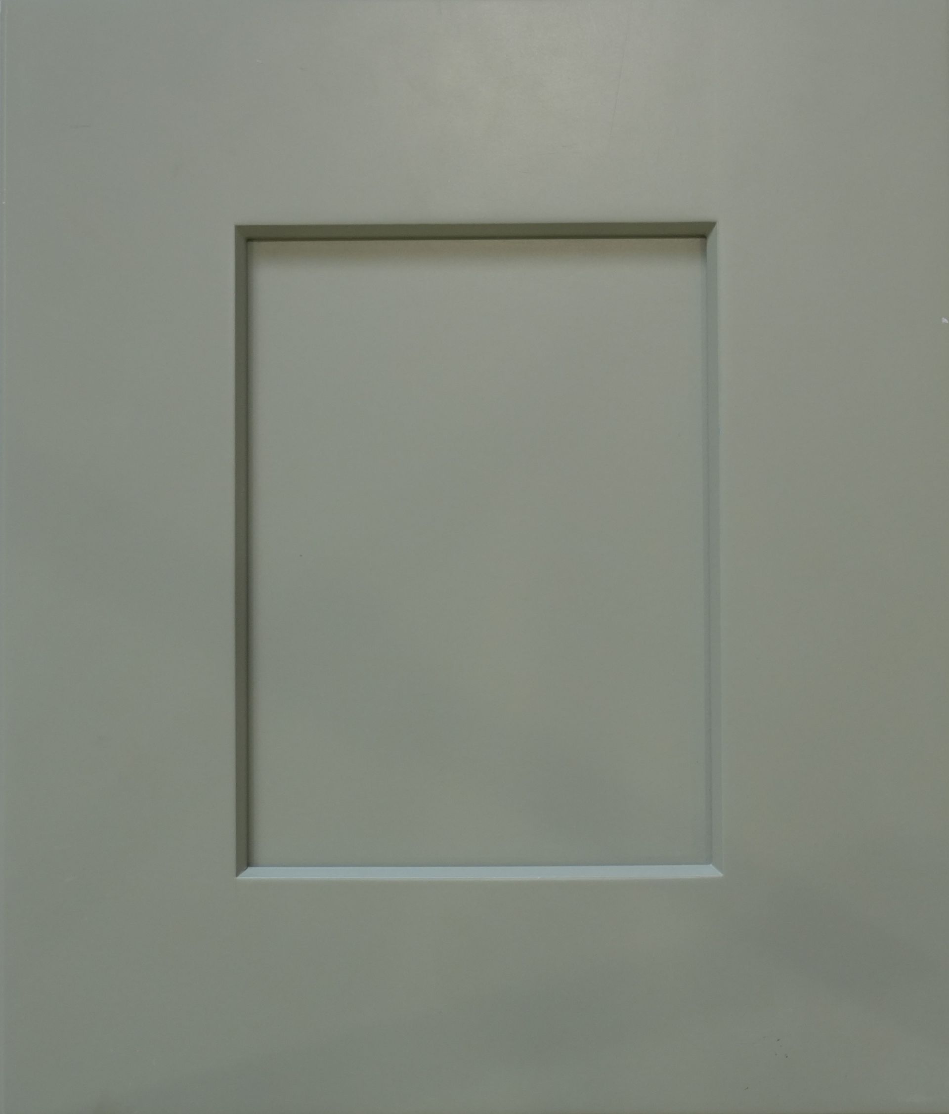 A plain gray cabinet door with a recessed rectangular panel.