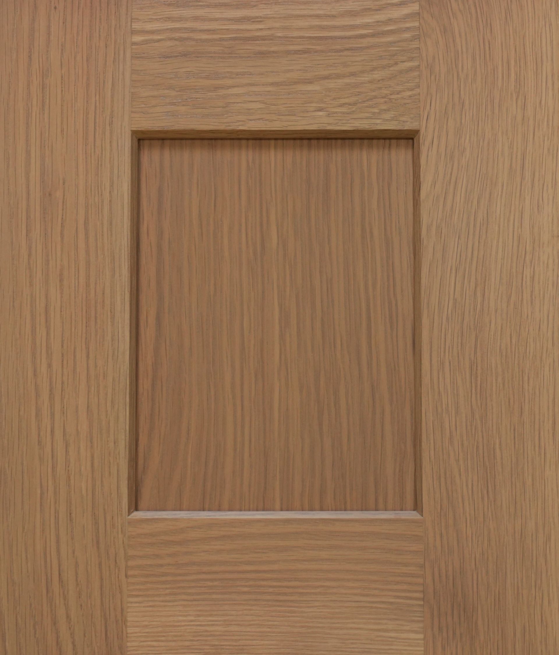Wooden cabinet door with a recessed rectangular panel.