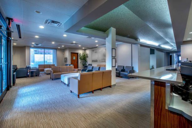 A large room with a lot of furniture and a counter.