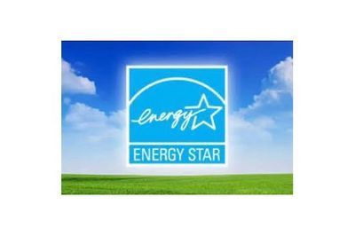 Energy Star logo on a blue sky background with green grass below