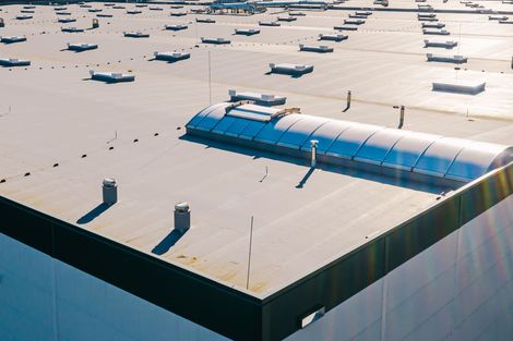 An aerial view of the roof of a large building.