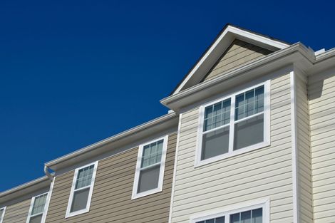 A building with a blue sky in the background