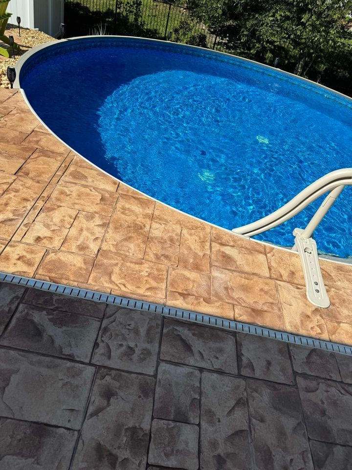 A swimming pool with a staircase leading to it.