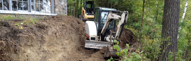 Backhoe excavating a land.