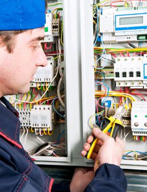 Electrician Troubleshooting the Electrical System