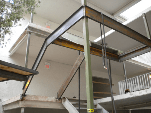 A staircase is being built in a building under construction