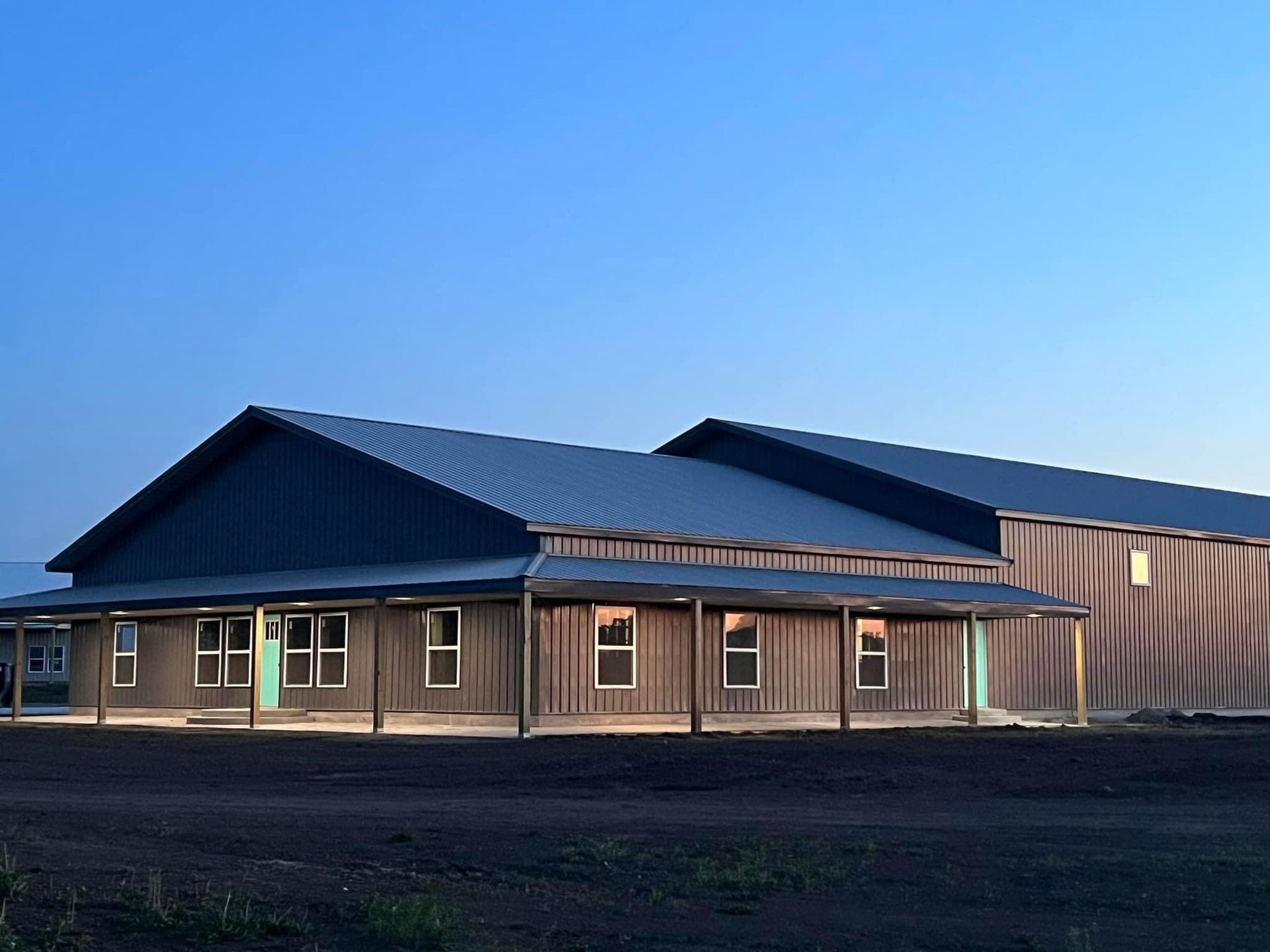 A large building with a blue sky in the background