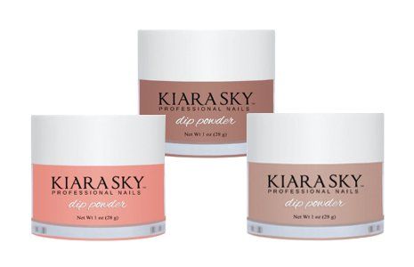 Three Kiara Sky dip powder jars in pink and brown shades.