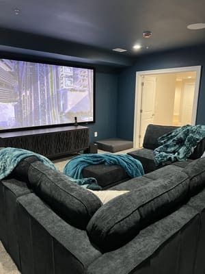 There is a pool table in the middle of the room.