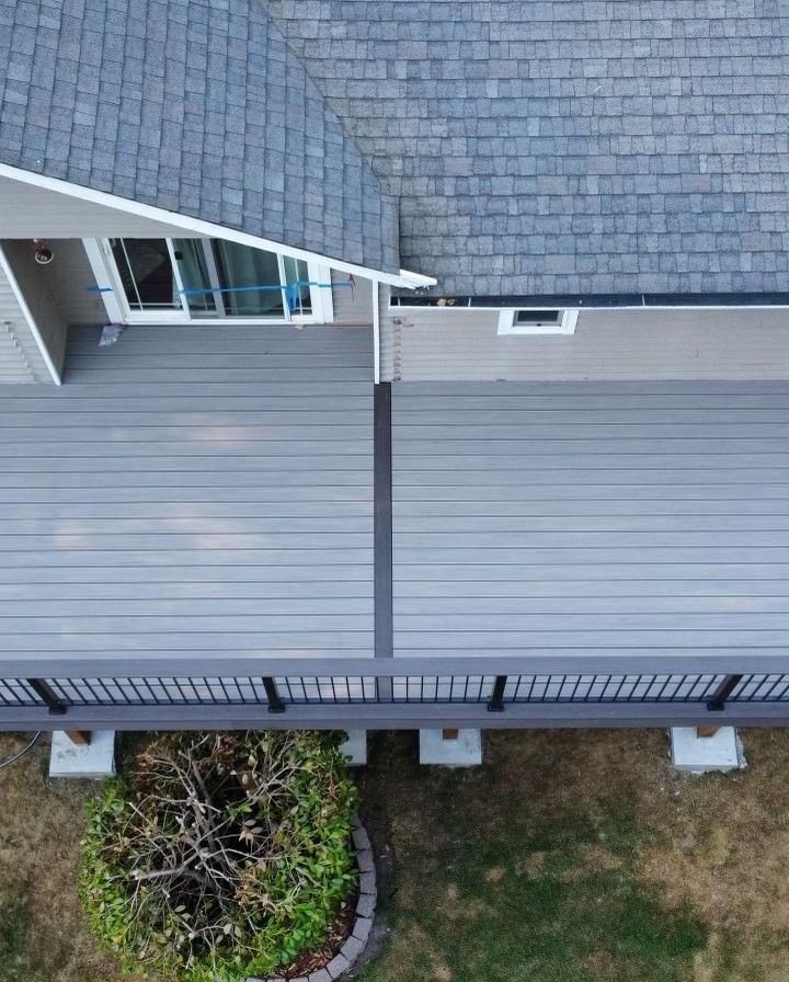 An aerial view of a deck and roof of a house.