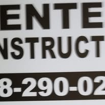 Partial black-and-white sign with cropped text reading “ENTE,” “NSTRUCT,” and phone number “8-290-02.”